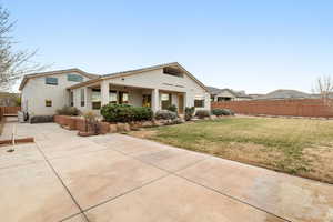 View of front facade featuring stucco siding