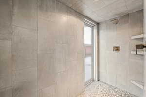 Bathroom with a tile shower