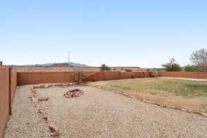 View of fenced backyard