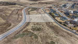 Aerial overview of property's location with nearby suburban area