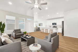 Virtually stage living, dining and kitchen areas