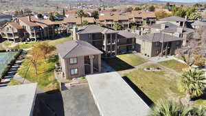 Aerial view of residential area featuring a mountainous background