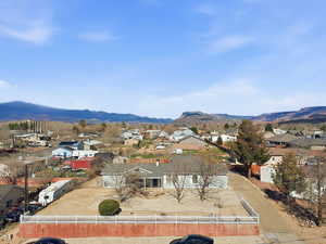 View of mountain background featuring nearby suburban area