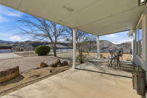 View of patio with a mountain view