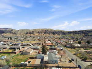 Aerial view of residential area with a mountainous background