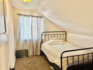 View of carpeted bedroom