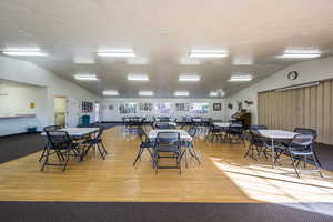 Dining space with light wood-style flooring