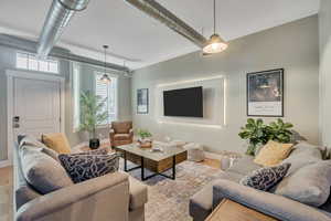 Living area featuring baseboards