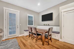 Dining space featuring light wood-style floors and baseboards