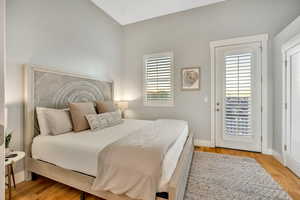 Bedroom featuring light wood-style floors and access to outside