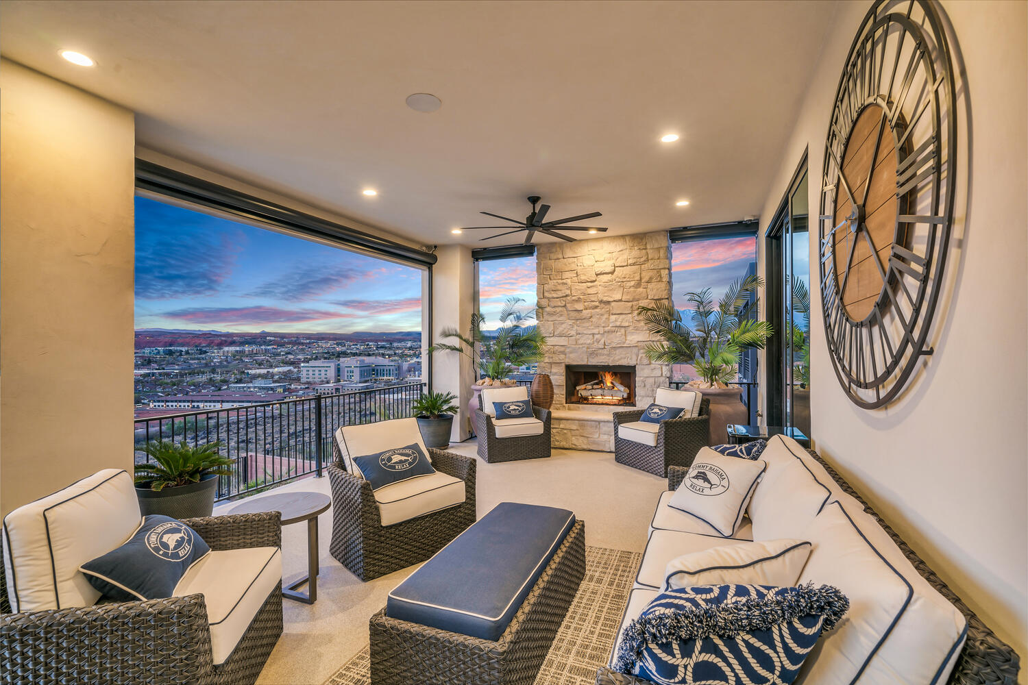 View of patio with outdoor seating and a ceiling fan