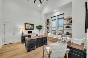Office with vaulted ceiling, light wood-style flooring, recessed lighting, and ceiling fan