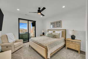 Bedroom with access to exterior, a ceiling fan, light colored carpet, and recessed lighting