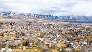 Aerial perspective of suburban area with mountains