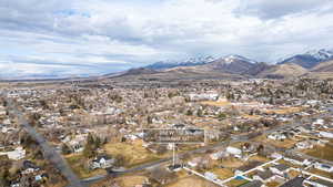 Mountain view featuring nearby suburban area