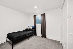Bedroom featuring carpet flooring and recessed lighting