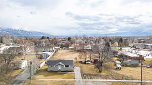 Aerial view of residential area featuring mountains