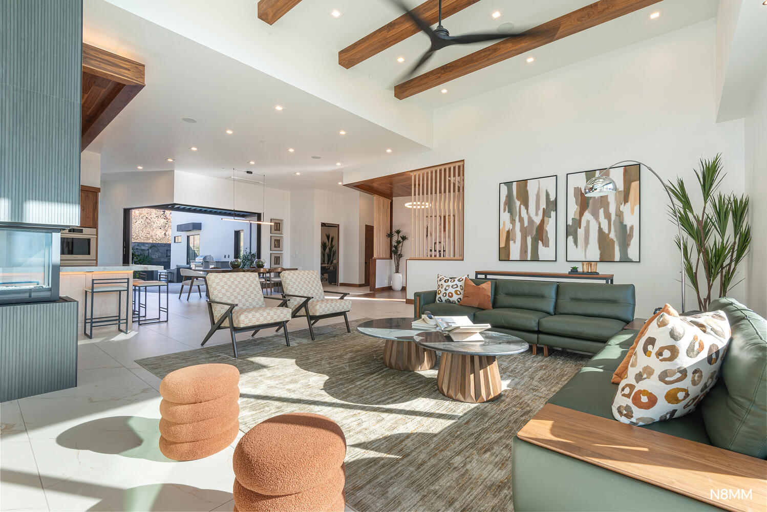 Living area featuring ceiling fan, recessed lighting, and lofted ceiling