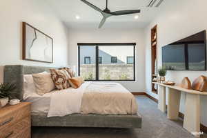 Bedroom with carpet and ceiling fan