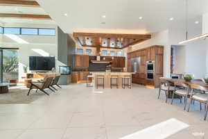 Kitchen featuring exceptional finishes from ceiling to floors. The large center island perfect for entertaining.