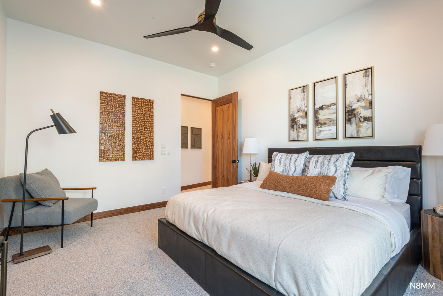 Carpeted bedroom featuring ceiling fan and recessed lighting