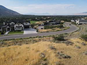 Mountain view featuring nearby suburban area