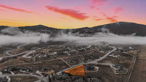 View of mountain background featuring nearby suburban area