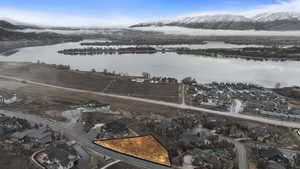 Aerial view of residential area with a water and mountain view