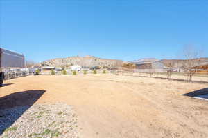 View of yard with a mountain view