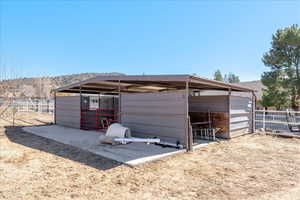 View of outdoor structure featuring an exterior structure
