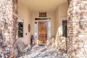 Property entrance with stucco siding