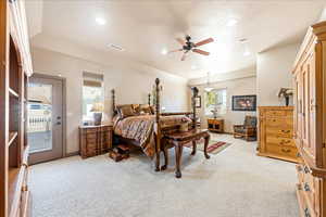 Bedroom with light carpet, ceiling fan, access to exterior, and recessed lighting