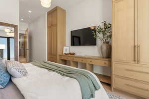 Bedroom featuring recessed lighting and baseboards