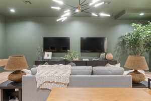 Living area featuring hanging lights