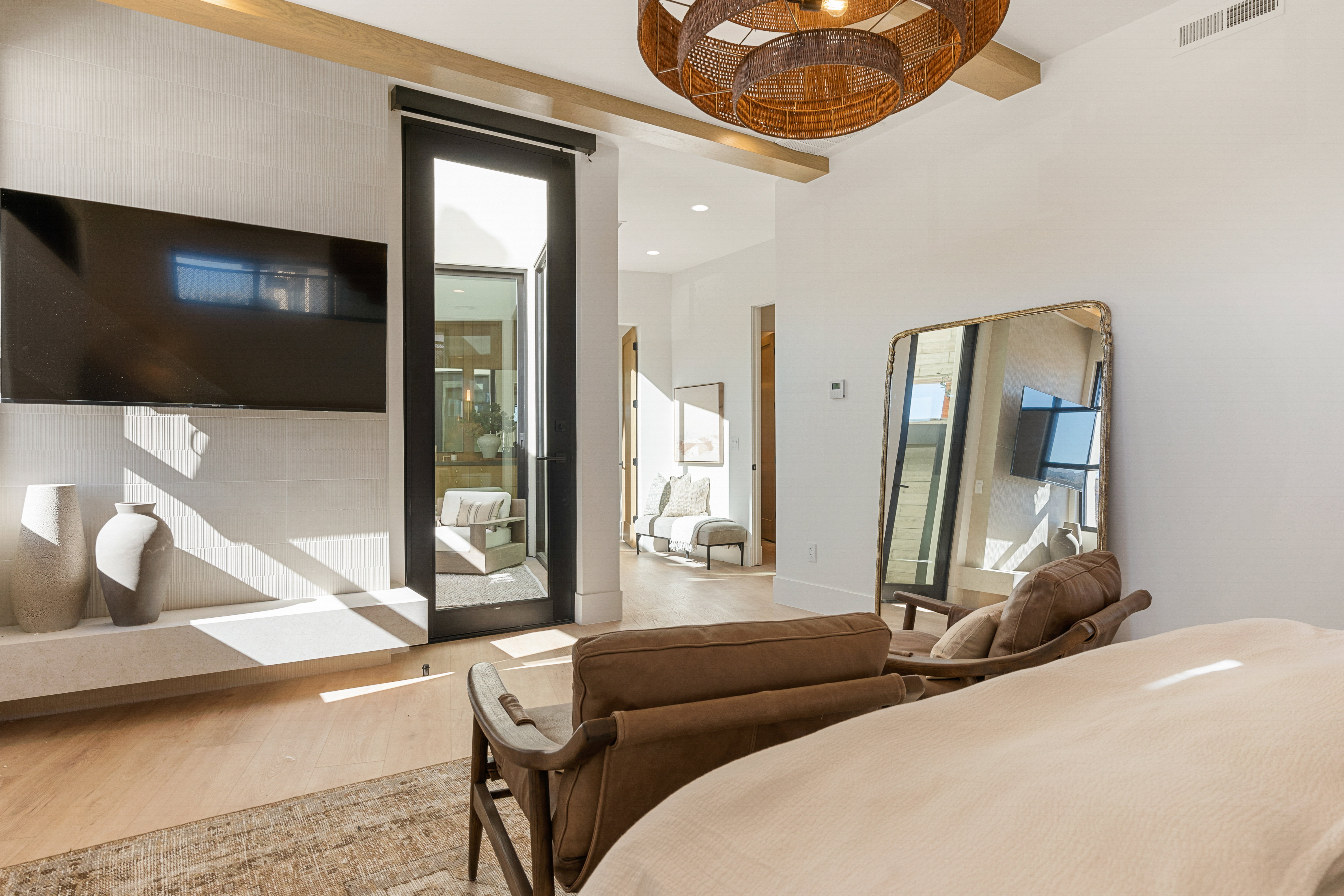 Bedroom featuring wood finished floors and baseboards