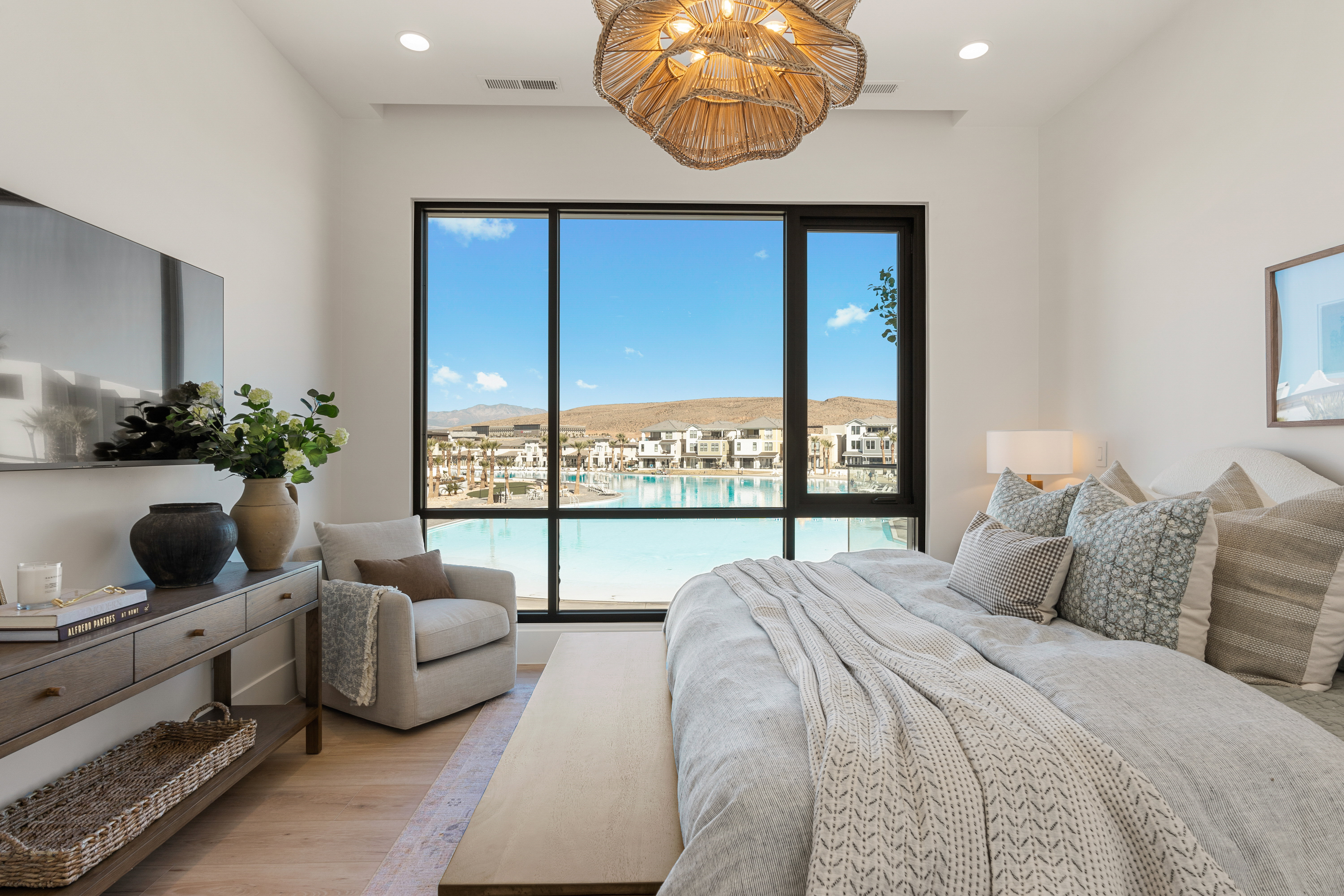 Bedroom featuring light wood finished floors, recessed lighting, a mountain view, and access to exterior
