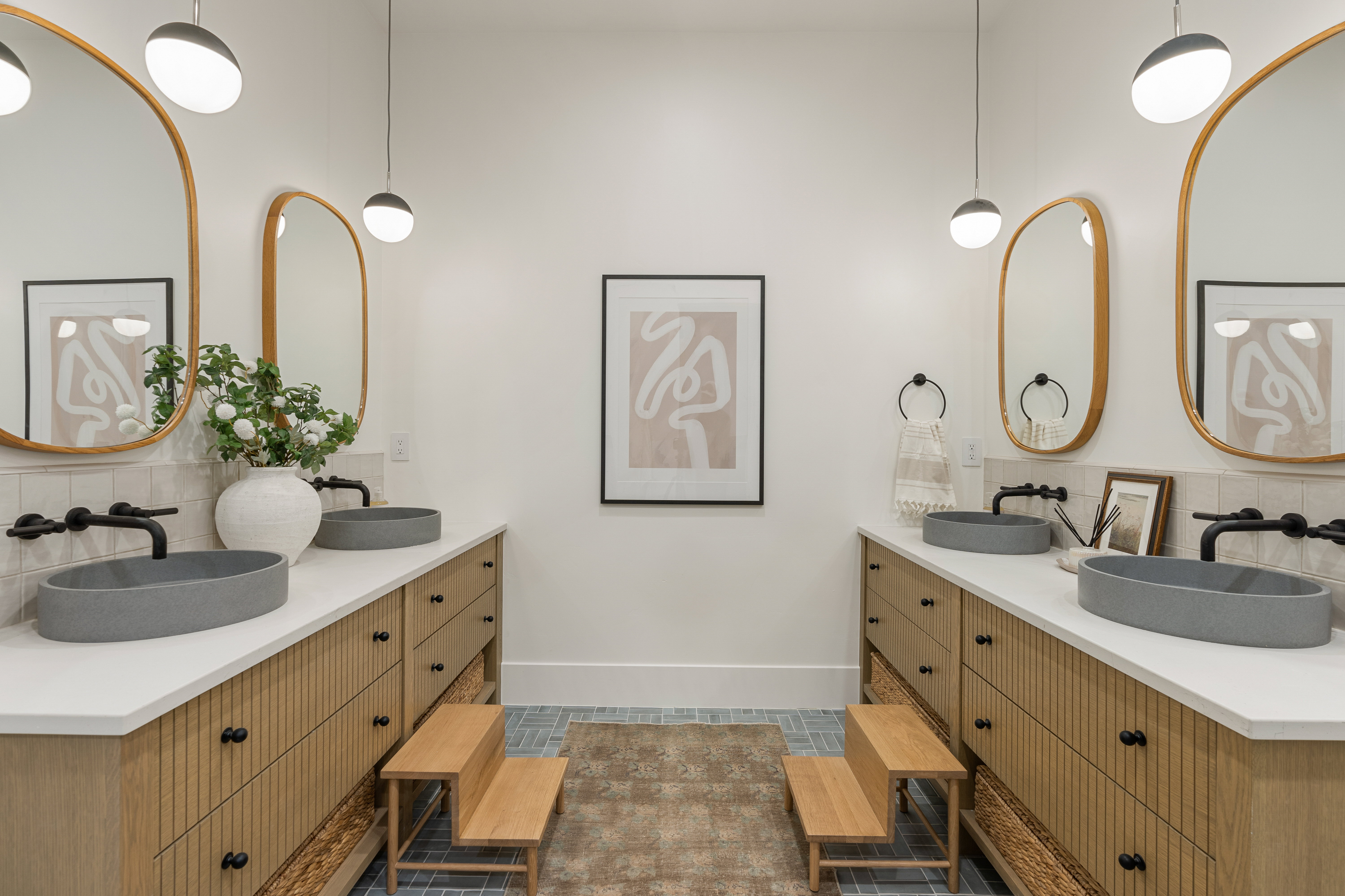 Bathroom with backsplash and double vanity