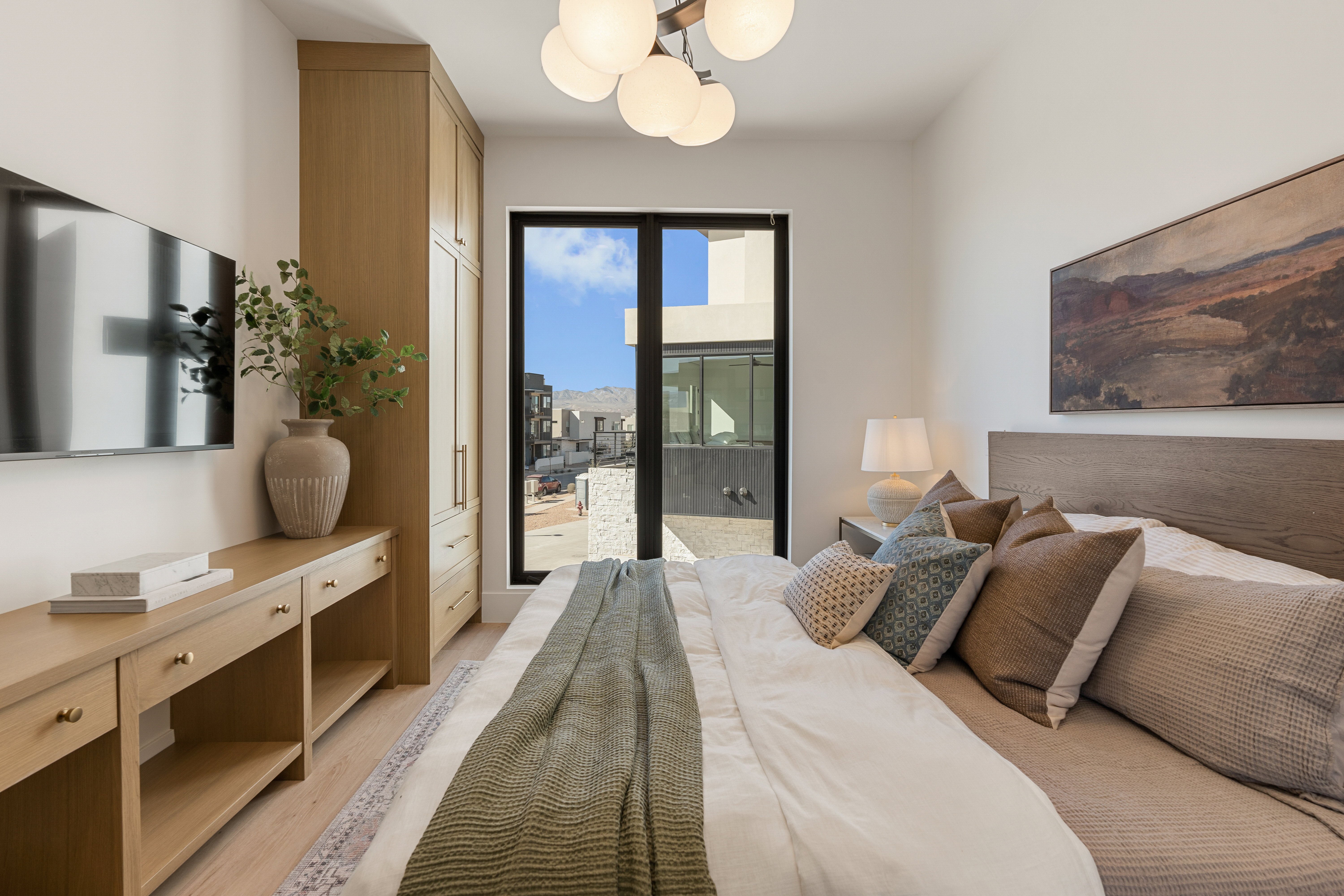 Bedroom featuring light wood-style flooring and access to exterior