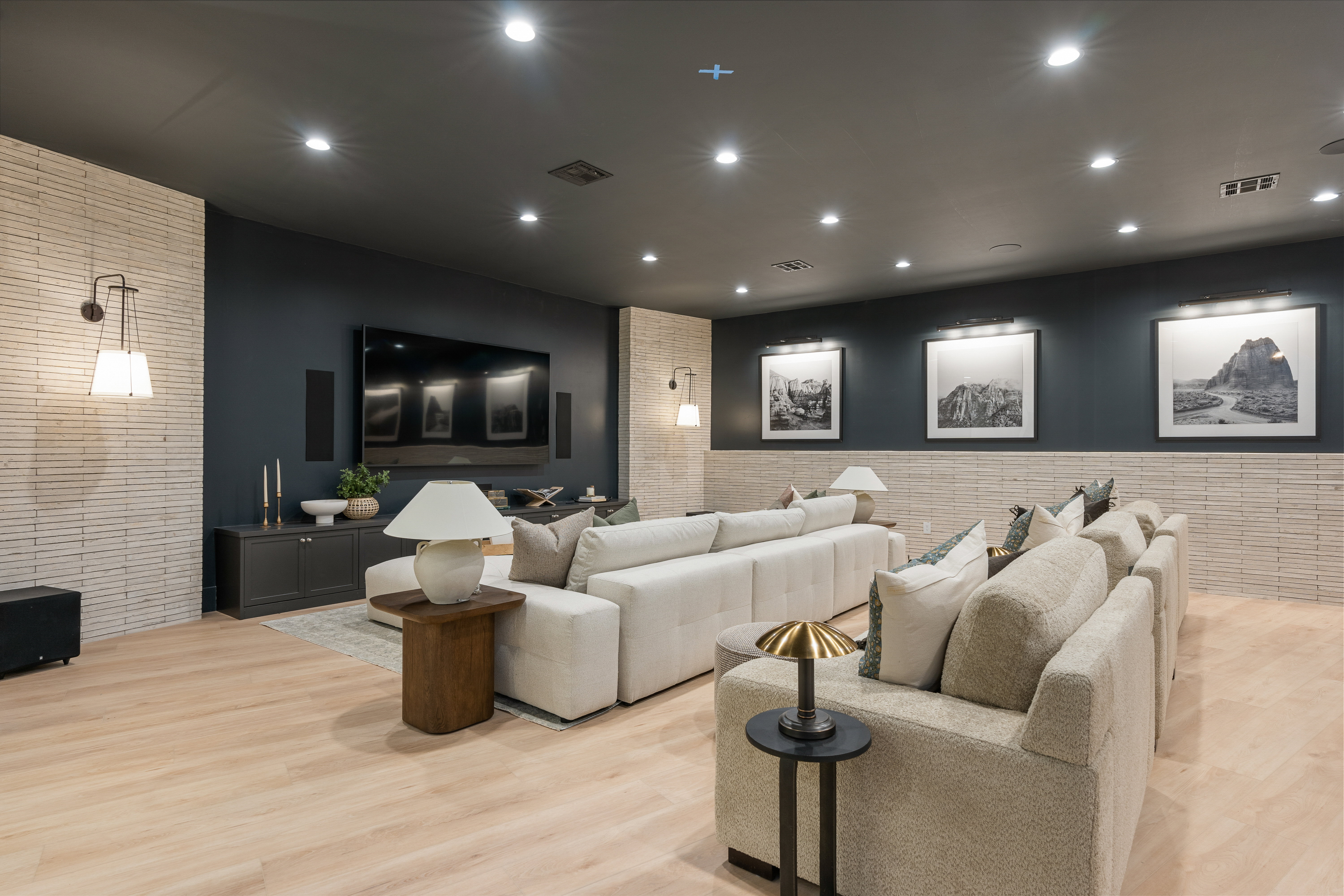 Home theater room featuring recessed lighting and light wood finished floors