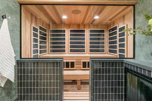 Sauna / steam room with recessed lighting