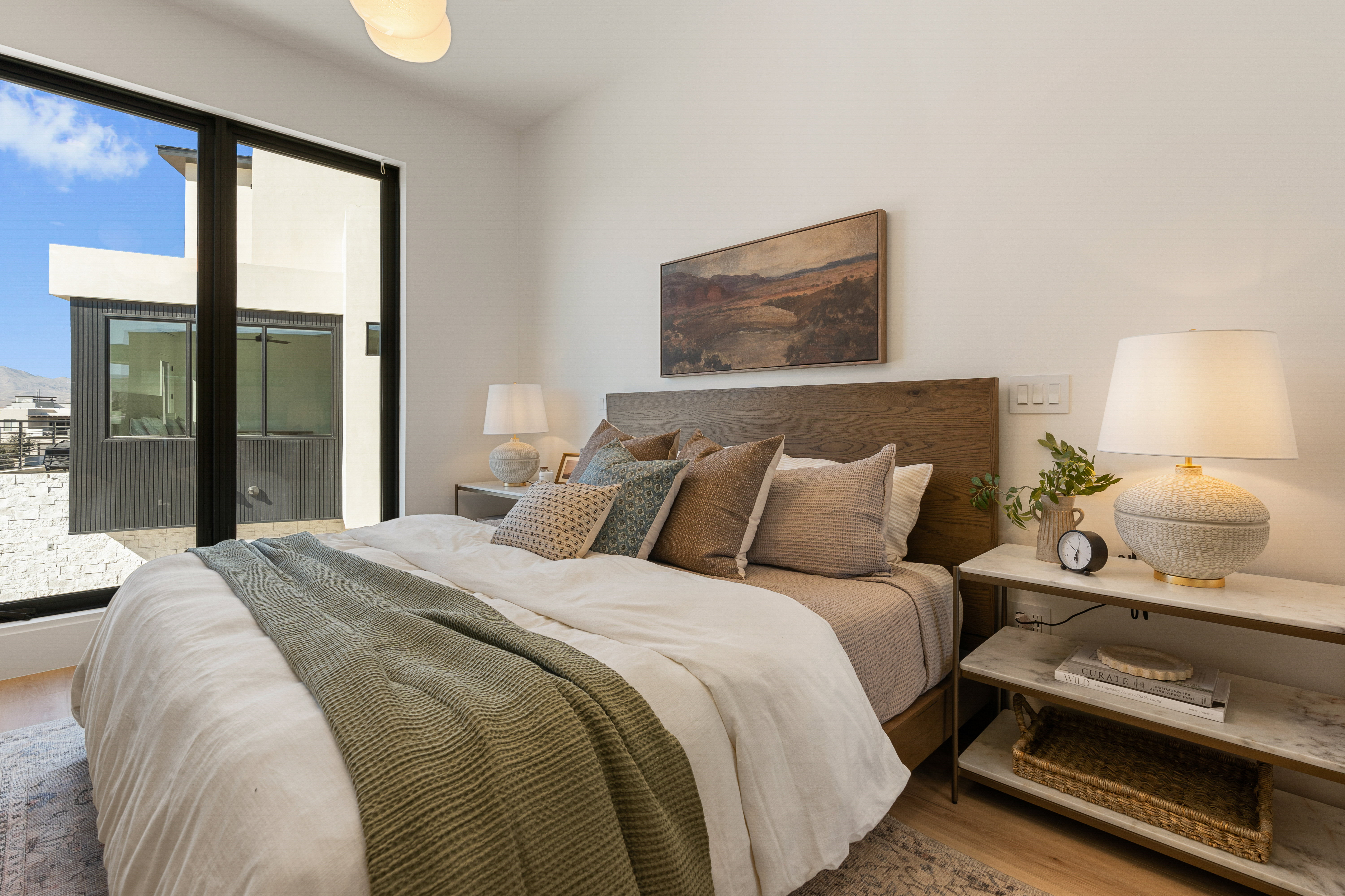 Bedroom featuring access to outside and light wood-type flooring