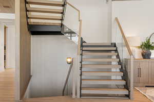 Staircase with wood finished floors