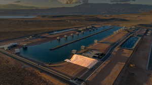 Aerial overview of property's location with a water and mountain view