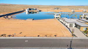 Bird's eye view of a water and mountain view and a desert landscape