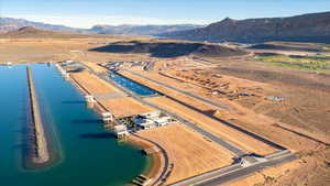 Aerial overview of property's location with a water and mountain view