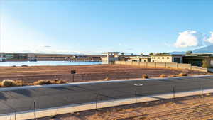 View of asphalt street with curbs