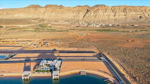 Aerial view of a mountain backdrop and a desert landscape