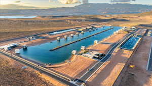 Aerial view of property's location featuring a nearby body of water