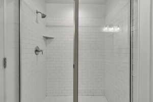 Full bathroom featuring a stall shower