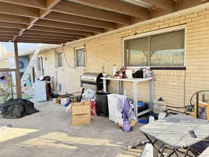 View of patio / terrace with grilling area and washer / dryer